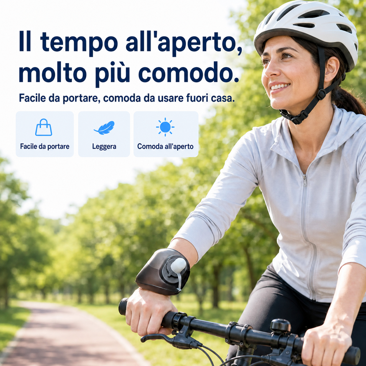 Donna in bicicletta su un viale alberato con la borraccia da polso HydraBand allacciata al polso destro